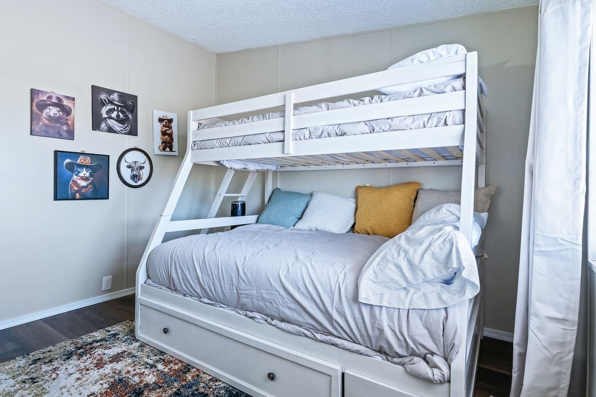 Bunk bed with soft bedding in the second bedroom