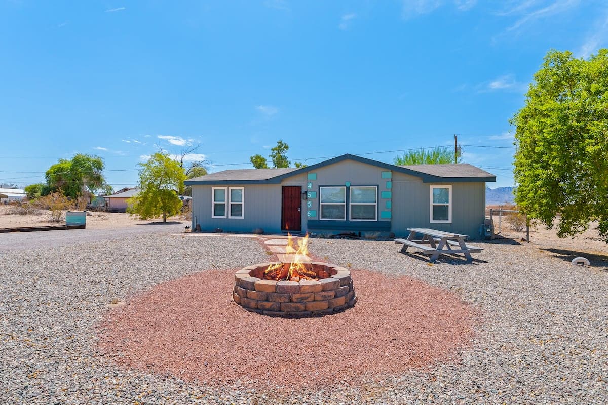 Backyard fire pit in the gravel outdoor area