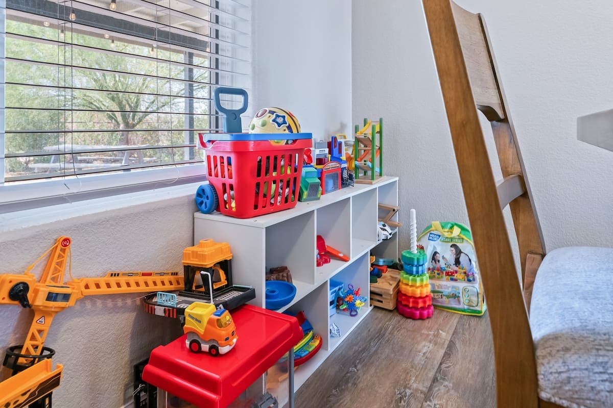 Children’s toys arranged on shelves in the family play area