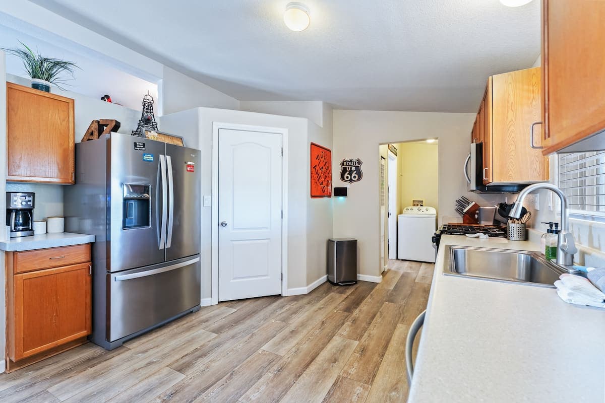 Kitchen with wood cabinets and stainless-steel appliances